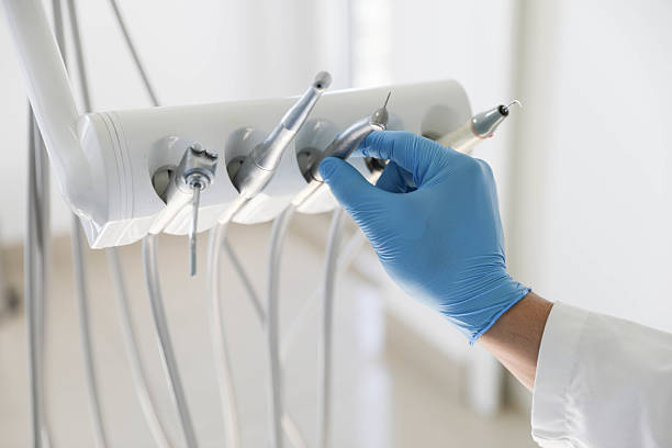 Professional Root Canal Treatment technician working in Toledo, OH